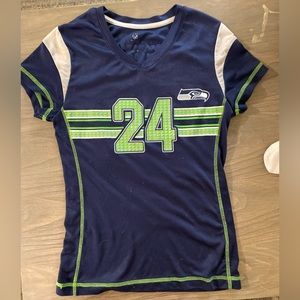 Girls’ Seattle Seahawks jersey, size medium.